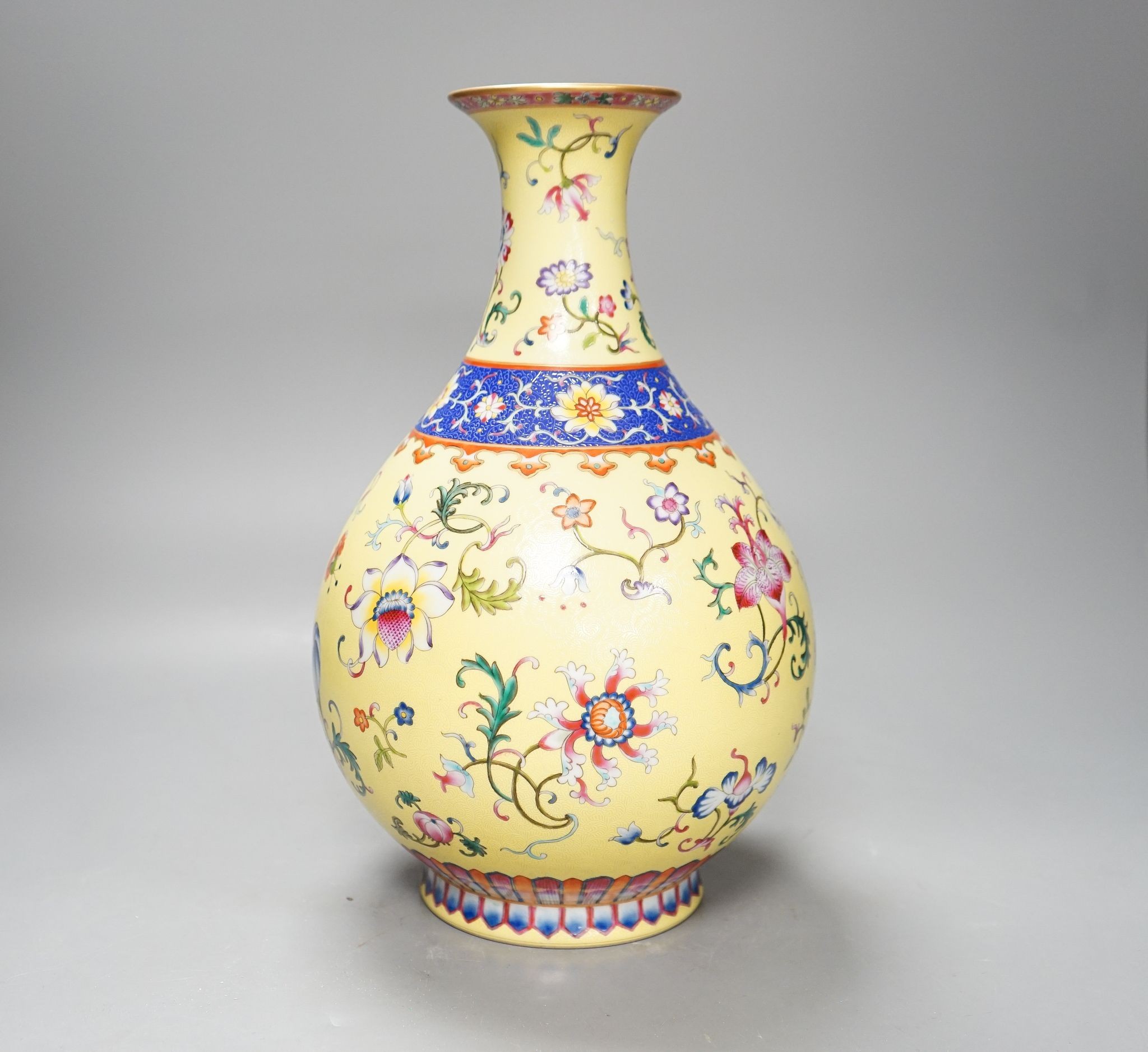 A Chinese yellow-ground porcelain pear-shaped vase, 34cm